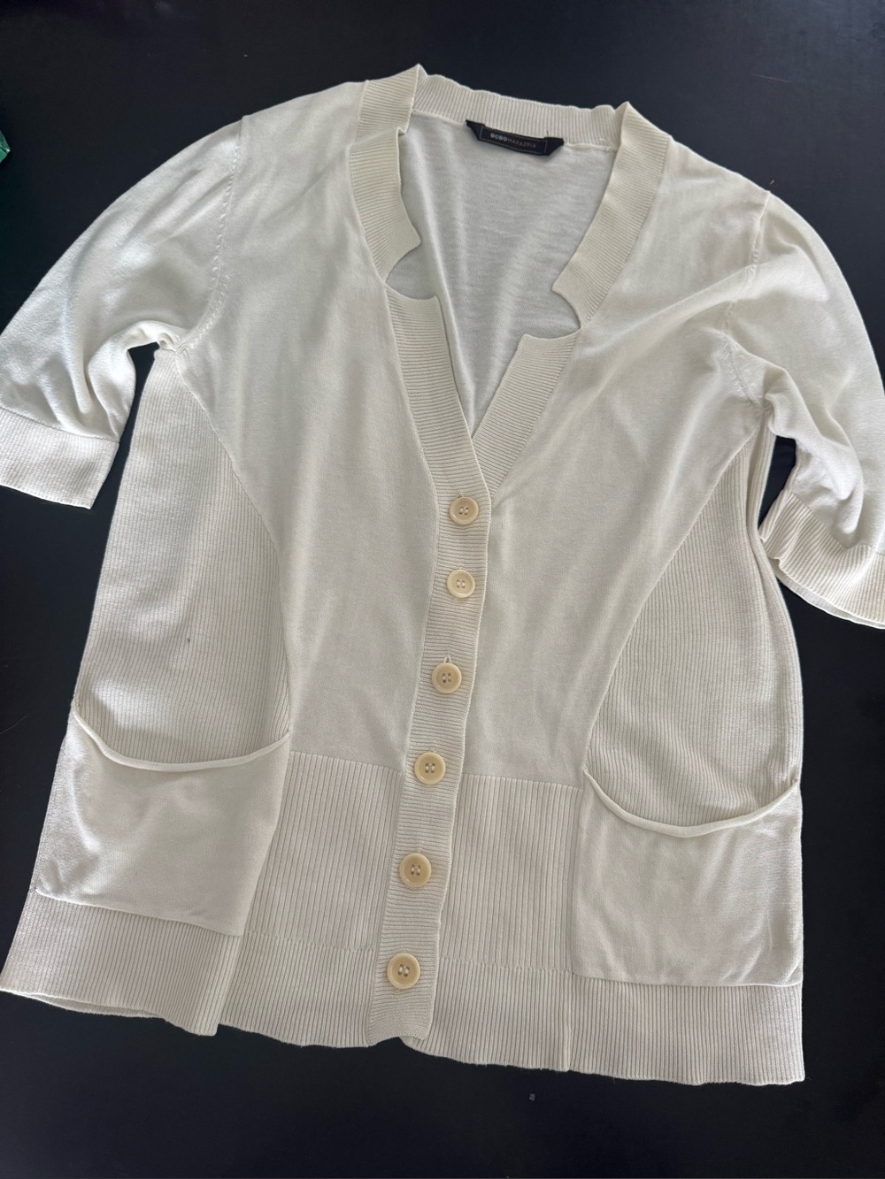 BCBGMAXAZRIA cardigan features a distinctive notched v-neckline sz M